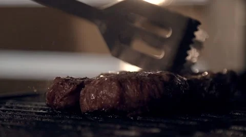 Fried meat in slow motion Stock Footage 67863088