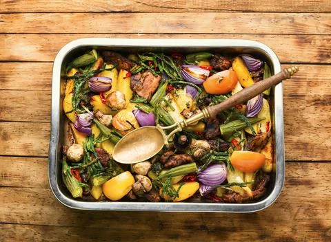 Fried meat with vegetables Stock Photos