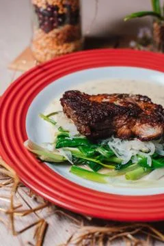 Fried meat with vegetables sauce Stock Photos