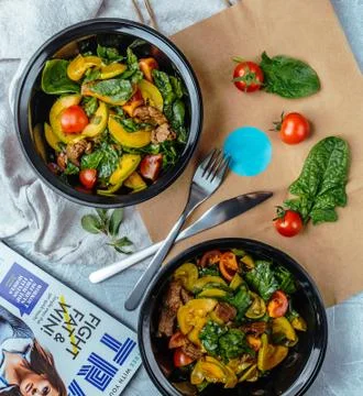 Fried meat with vegetables on the table Stock Photos