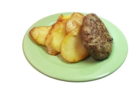 Fried minced meat cutlets with a side dish of fried potato round slices, on.. Stock Photos