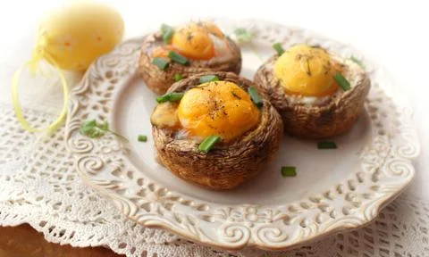 Fried mushrooms with eggs (Easter table) Stock Photos