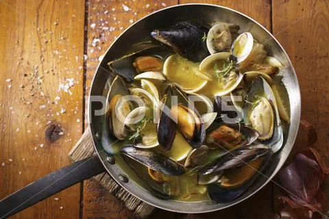 Fried mussels Stock Photos