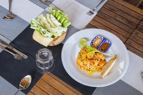 Fried noodle wrapped with eggs, Thai style food , Pad thai Stock Photos