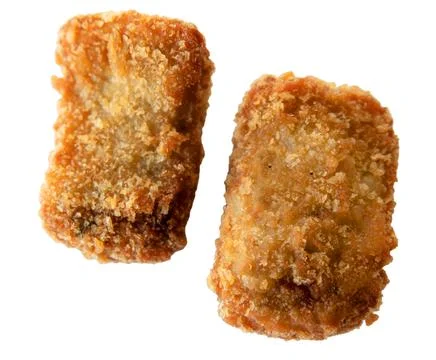Fried nuggets isolated on white background. Top view close up image. Stock Photos