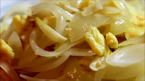 Fried onion and egg Stock Footage 38421927