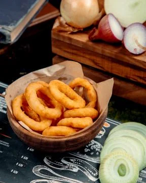 Fried onion rings on the table Stock Photos