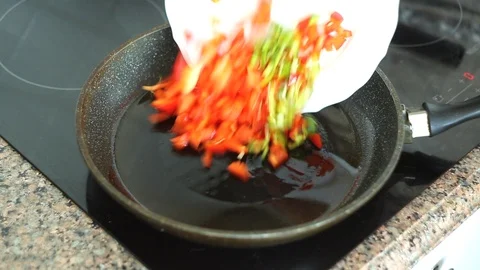 Fried in a pan zucchini with paprika. 库存影片 116819775