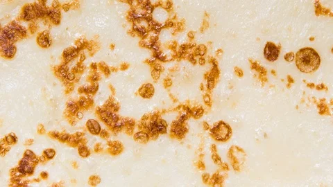 Fried pancake, textured background, motion graphic Stock Footage 123054916