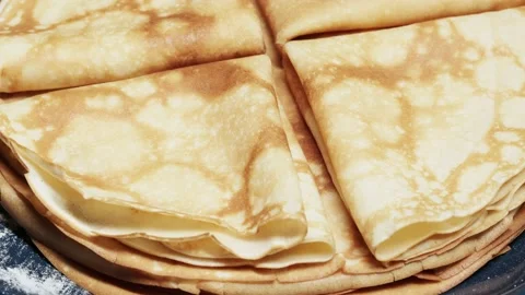 Fried pancakes in a stack and corners Stock Footage 232293444