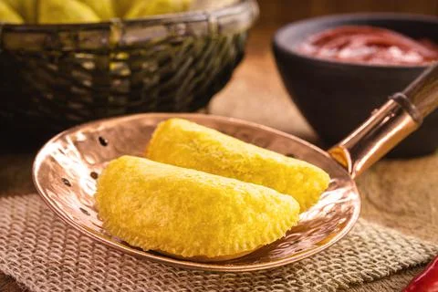 Fried pastry of corn dough typical of Brazil Stock Photos