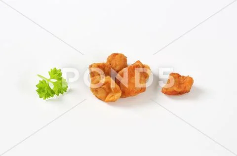 Fried pieces of pork rind and fat Stock Photos