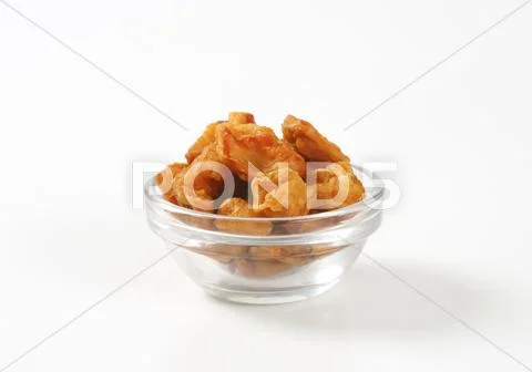 Fried pieces of pork rind and fat Stock Photos