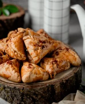 Fried pies with meat on the table Stock Photos