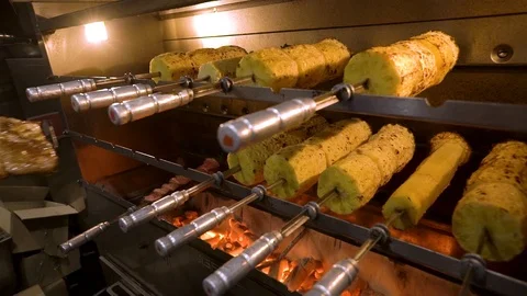 Fried pineapples preparing on professional grill at the restaurant Stock Footage 104018113