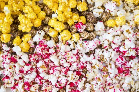 Fried popcorn on the white background Stock Photos