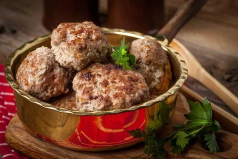 Fried pork chops in the pan. Stock Photos