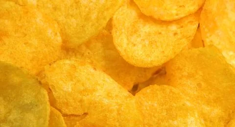 Fried potato chips background Foto stock