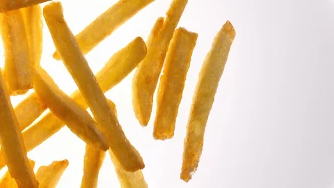 Fried potato chips rotating on white background in 4K with free place for text Stock Footage 91066085