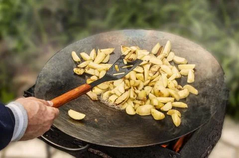 Fried potatoes on the grill Stock Photos