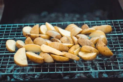 Fried potatoes on the grill Stock Photos