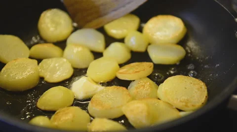 Fried potatoes in a pan Stock Footage 45358737