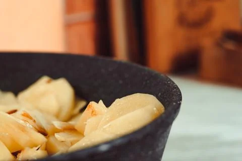 Fried potatoes in a pan 库存照片