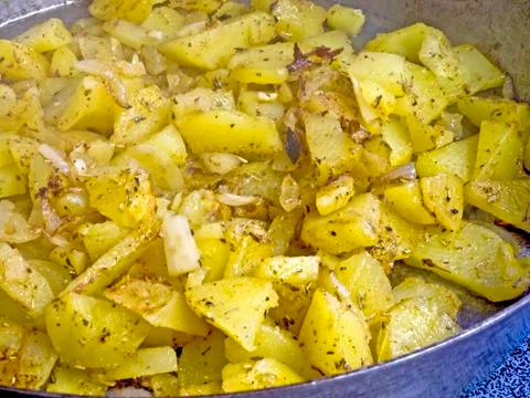 Fried potatoes Stock Photos