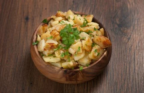 Fried potatoes Stock Photos