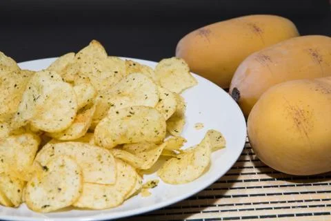Fried potatoes Stock Photos