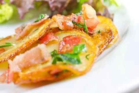 Fried potatoes Stock Photos