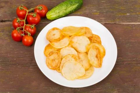 Fried potatoes Stock Photos