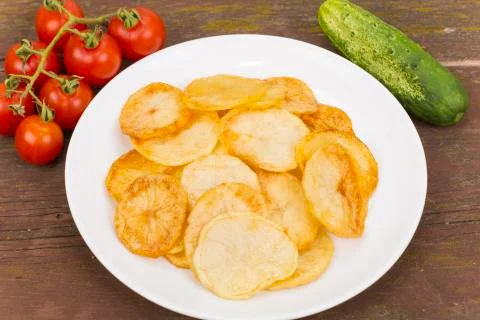 Fried potatoes Stock Photos