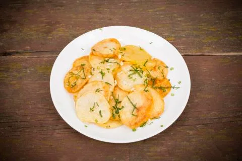 Fried potatoes Stock Photos
