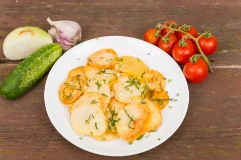 Fried potatoes Stock Photos