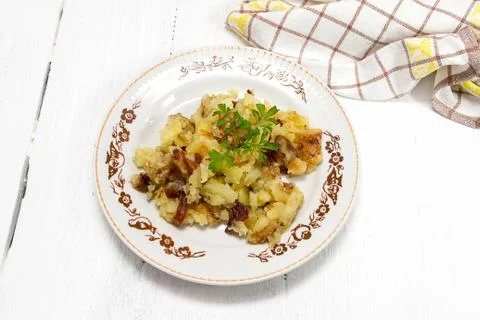 Fried potatoes Stock Photos