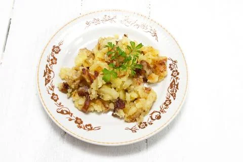 Fried potatoes Stock Photos