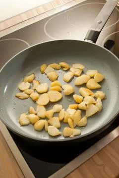 Fried potatoes Stock Photos