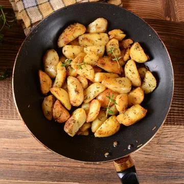 Fried potatoes Stock Photos