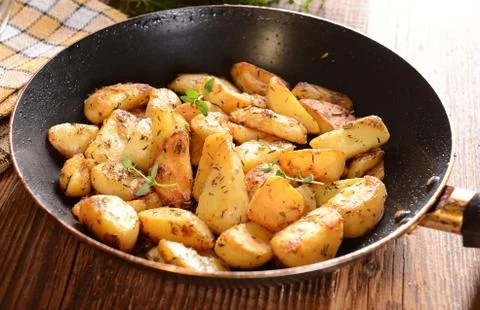 Fried potatoes Stock Photos