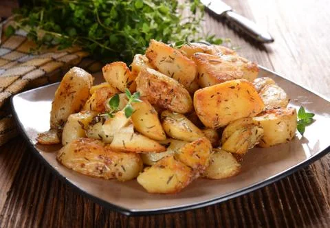 Fried potatoes Stock Photos