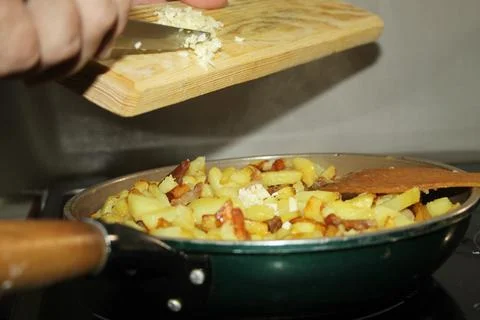Fried potatoes Stock Photos