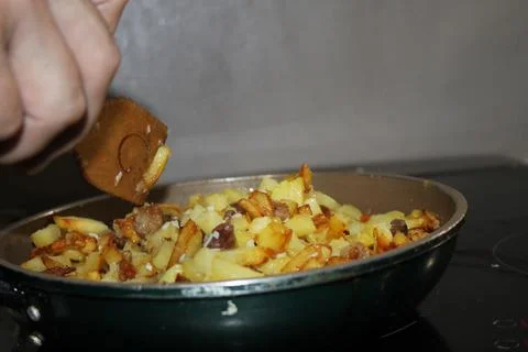 Fried potatoes Stock Photos