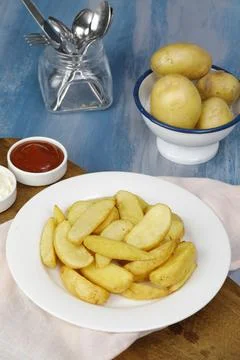 Fried potatoes Stock Photos
