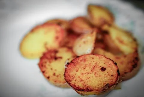Fried potatoes Stock Photos
