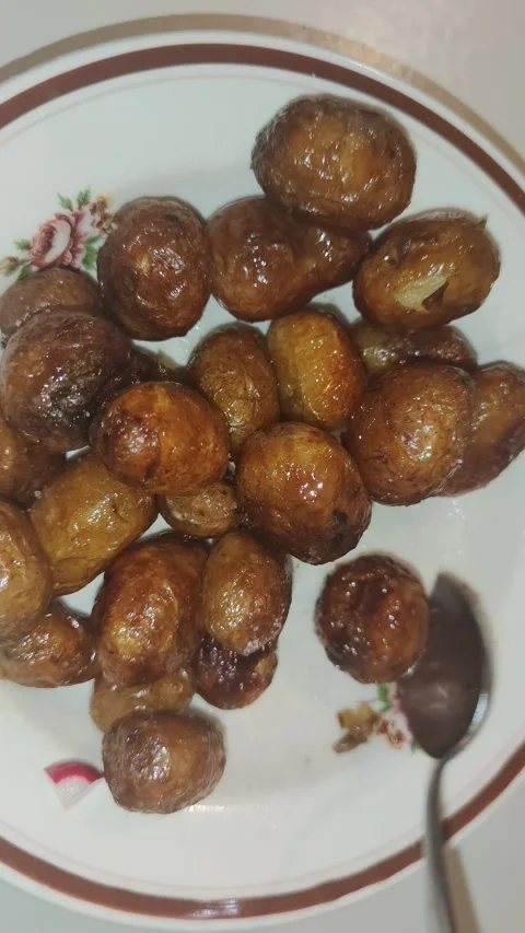 Fried potatoes in the plate 動画素材 243378553