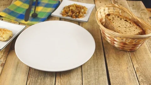 Fried potatoes in a white plate Stock Footage 108448247