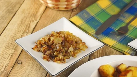 Fried potatoes in a white plate Stock Footage 108448967