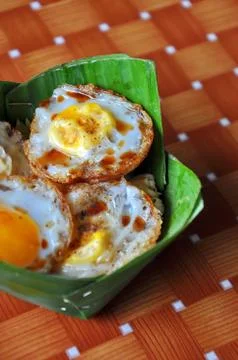 Fried quail eggs Stock Photos