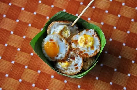 Fried quail eggs Stock Photos